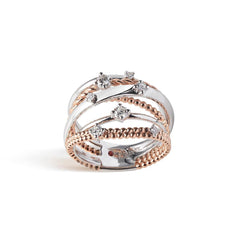 Intertwined bandring in 18 kt white and rose gold set with seven diamonds